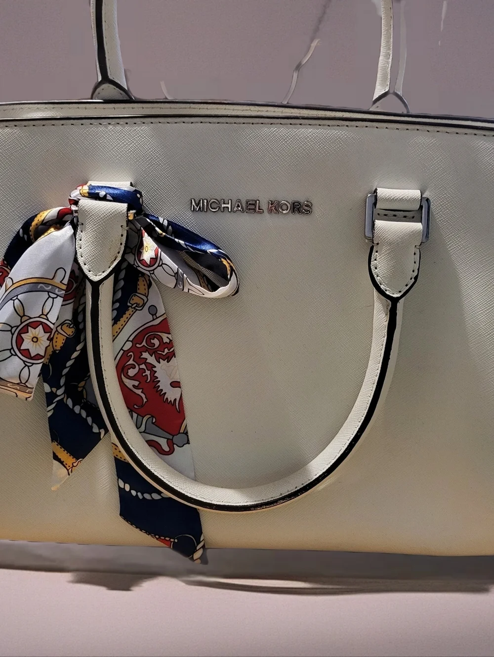 Michael Kors White Leather Satchel with Silver Metal Grommets.